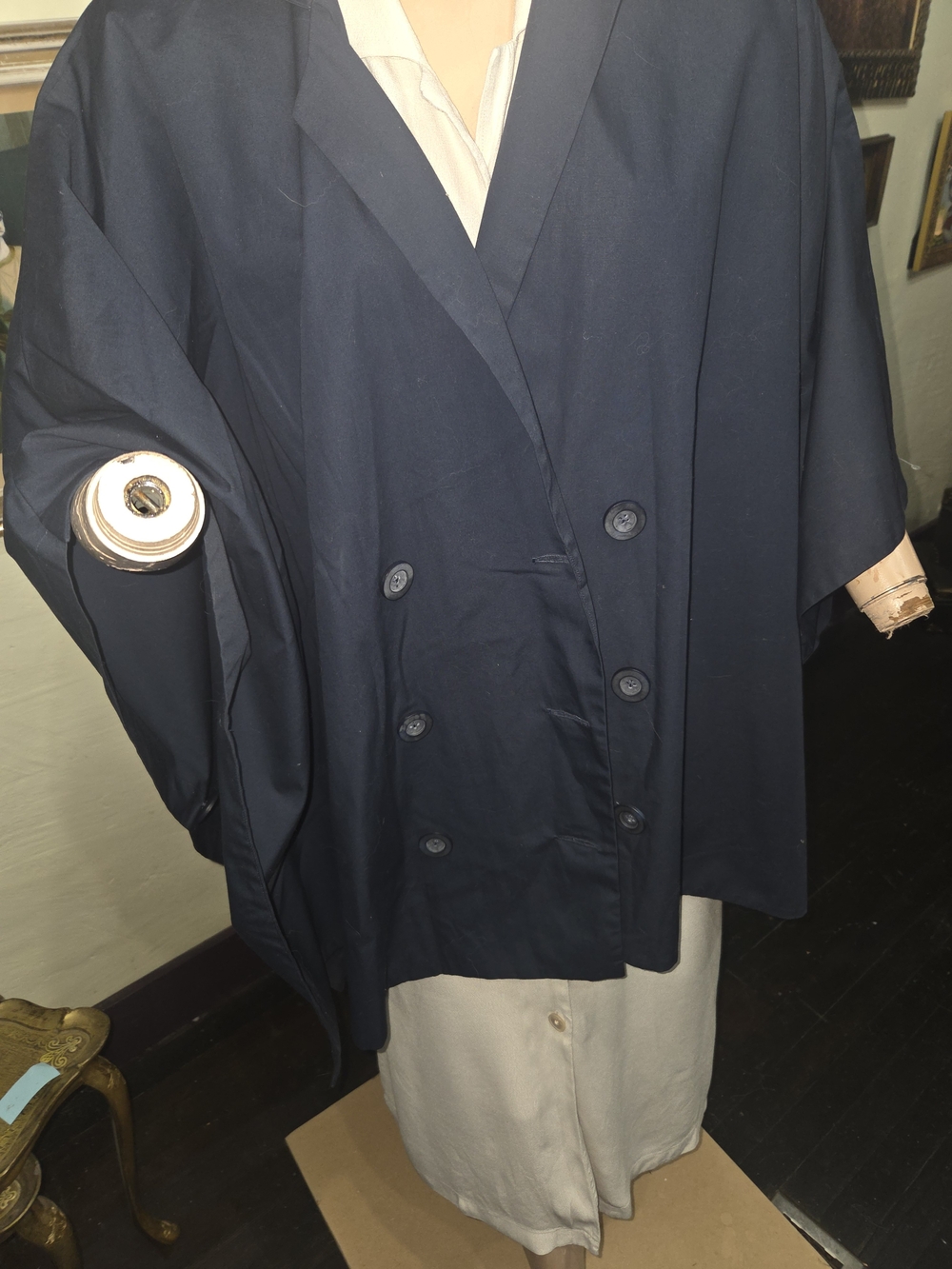 Navy blue poncho style jacket